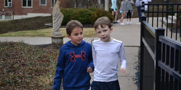 Friendships in and around Cardinal Pacelli school during a nice Fish Fry Night. (CT Photo/Greg Hartman)