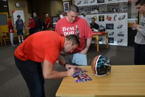 Garrett Celek signs an autograph at La Salle High School (CT Photo/Greg Hartman)
