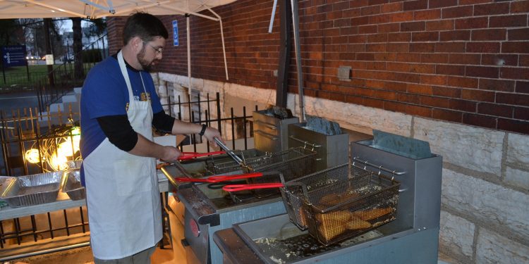 Kenny Haber oversees the fish at St. Cecilia Fish Fry in Oakley (CT Photo/Greg Hartman)