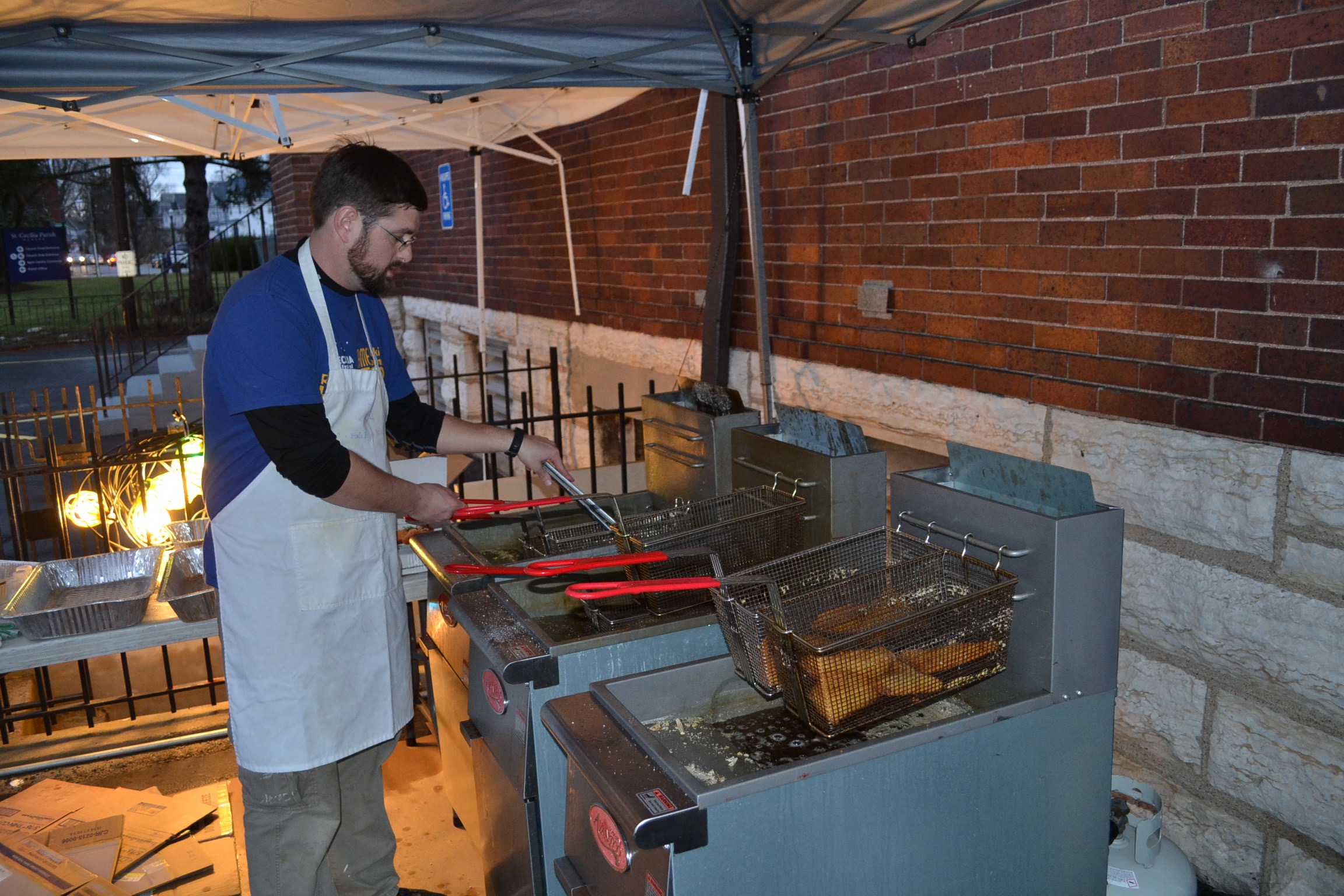 Kenny Haber oversees the fish at St. Cecilia Fish Fry in Oakley (CT Photo/Greg Hartman)