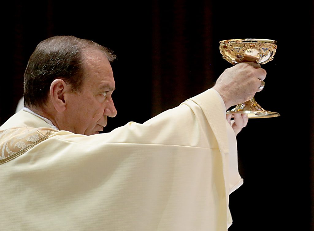 Archbishop Dennis Schnurr during the Solemn Evening Mass of the Lord’s Supper on Holy Thursday at the Cathedral of Saint Peter in Chains. " And likewise the cup after they had eaten, saying, “This cup is the new covenant in my blood, which will be shed for you.." LK 22:20 (CT Photo/E.L. Hubbard)