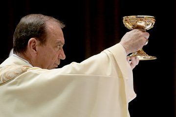 Archbishop Dennis Schnurr during the Solemn Evening Mass of the Lord’s Supper on Holy Thursday at the Cathedral of Saint Peter in Chains. " And likewise the cup after they had eaten, saying, “This cup is the new covenant in my blood, which will be shed for you.." LK 22:20 (CT Photo/E.L. Hubbard)