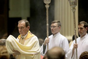 Archbishop Dennis Schnurr processes the Blessed Sacrament for the Transfer of the Most Blessed Sacrament .(CT Photo/E.L. Hubbard)