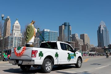 The statue of St. Patrick leads the annual St. Patrick's Day Parade in Cincinnati Saturday, Mar. 10, 2018. (CT Photo/E.L. Hubbard)