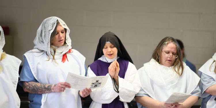 Five women entered the catholic church on Easter Monday, April 2, 2018. (CT Photo/Mark Bowen)