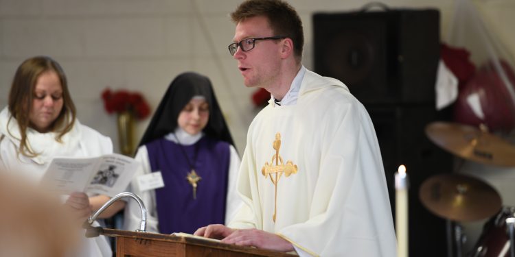 Rev. Ethan Moore proclaims the gospel on Easter Monday at the Dayton Correctional Institution (CT Photo/Mark Bowen)