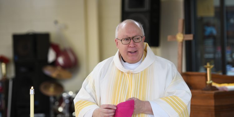 Bishop Biinzer delivers his homily at the Dayton Correctional Institution (CT Photo/Mark Bowen)