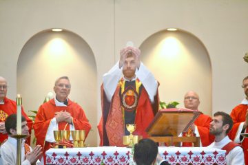 Rev. Jacob Willig during Eucharistic Prayer I "...this is my body which will be given up for you." (CT Photo/Greg Hartman)