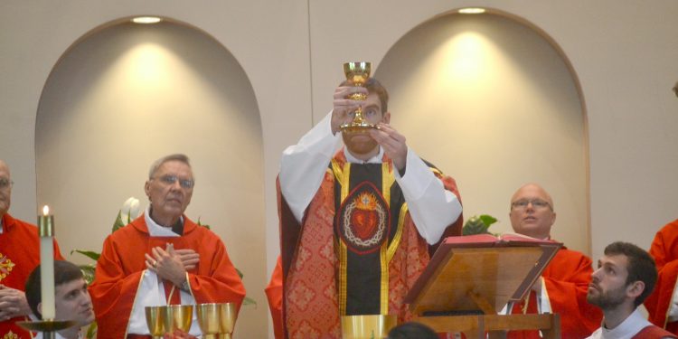 Rev. Jacob Willig durin Eucharistic Prayer I: "....and said Take this all of you and drink from it: this is the cup of my blood, the blood of the new and everlasting covenant. It will be shed for you and for all so that sins may be forgiven. Do this in memory of me." (CT Photo/Greg Hartman)