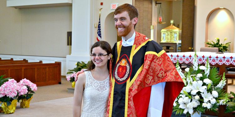 Rev. Jacob Willig poses with his sister (CT Photo/Greg Hartman)