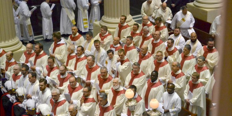 Priest throughout the Archdiocese of Cincinnati attended this most sacred of days at the Cathedral of St. Peter in Chains. (CT Photo/Greg Hartman)