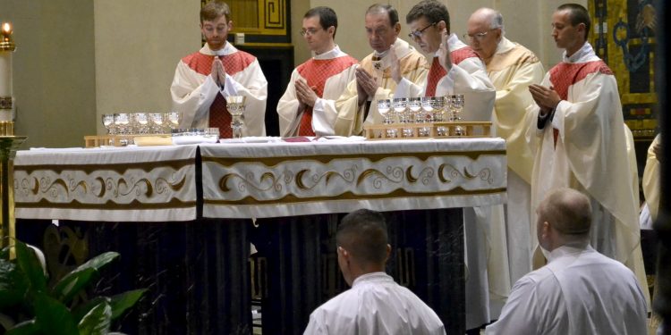 Rev. Craig Best during the Eucharistic Prayer (CT Photo/Greg Hartman)