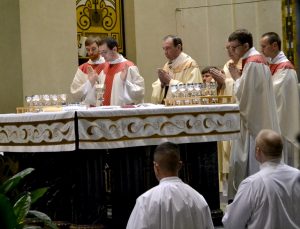 Rev. Andrew Smith during the Eucharistic Prayer (CT Photo/Greg Hartman)
