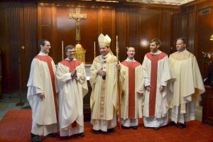 A very joyous day in the Archdiocese of Cincinnati as Archbishop Schnurr congratulates the newly ordained. (CT Photo/Greg Hartman)
