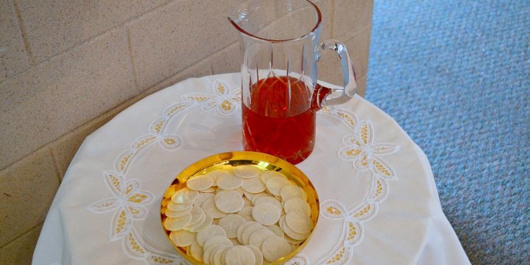 The gifts of bread and wine at St. Margaret St. John Parish (CT Photo/Greg Hartman)