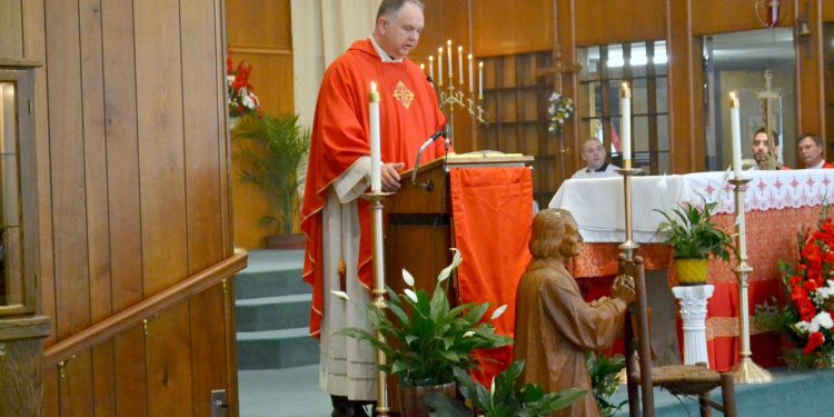 Rev. David Sunberg gives the homily for Rev. Craig Best First Mass of Thanksgiving. (CT Photo/Greg Hartman)