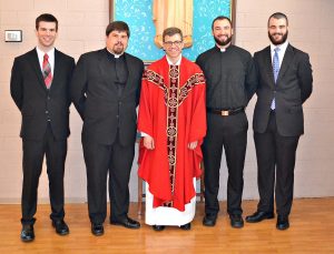 Rev. Craig Best with seminarians that attended his First Mass of Thanksgiving. (CT Photo/Greg Hartman)