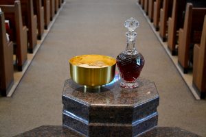 Gifts of bread and wine at St. Antoninus Parish. (CT Photo/Greg Hartman)