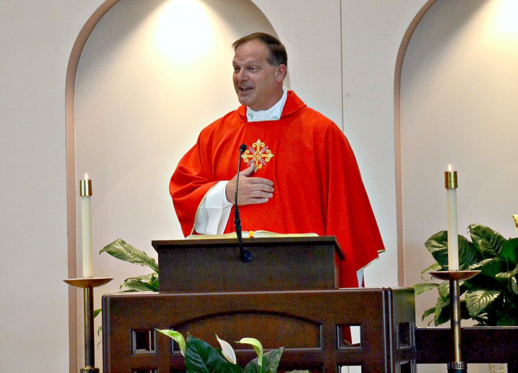 Rev. Anthony Brausch gives the homily at Rev. Jacob Willig's First Mass of Thanksgiving. (CT Photo/Greg Hartman)