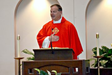 Rev. Anthony Brausch gives the homily at Rev. Jacob Willig's First Mass of Thanksgiving. (CT Photo/Greg Hartman)