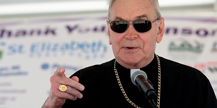 Bishop Roger Foys, Diocese of Covington, speaks during the Cross the Bridge for Life celebration on Riverboat Row in Newport, Sunday, June 3, 2018. (CT Photo/E.L. Hubbard)