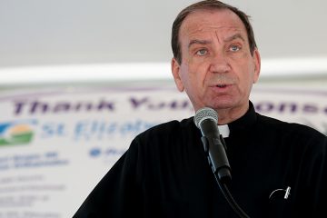 Archbishop Dennis Schnurr speaks and gives a blessing during the Cross the Bridge for Life celebration on Riverboat Row in Newport. Sunday, June 3, 2018. (CT Photo/E.L. Hubbard)