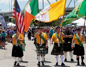 The Ancient Order of Hibernians Color Guard leads the procession during the Cross the Bridge for Life celebration on Riverboat Row in Newport, Sunday, June 3, 2018. (CT Photo/E.L. Hubbard)