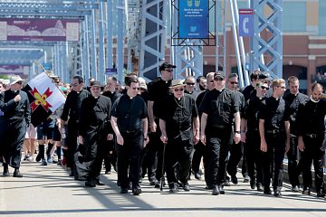 Priests from the Diocese of Covington and Archdiocese of Cincinnati cross the Purple People Bridge during the Cross the Bridge for Life celebration on Riverboat Row in Newport, Sunday, June 3, 2018. (CT Photo/E.L. Hubbard)