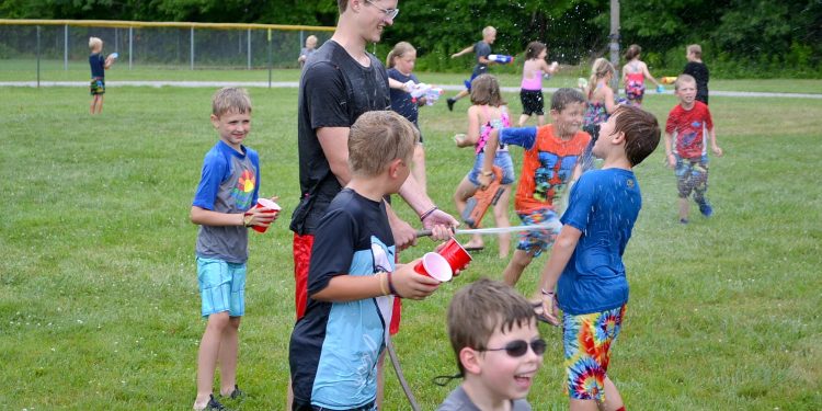 Afternoon fun as the water balloon fights began. (CT Photo/Greg Hartman)