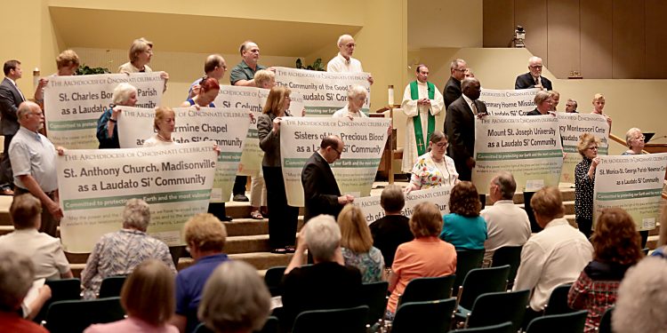 Archbishop Dennis Schnurr, center right, praises the awarded communities during the first annual Laudato Si’ Community recognitions ceremony at Good Shepherd Church in Cincinnati Monday, June 18, 2018. (CT Photo/E.L. Hubbard)