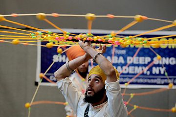 Shaheed Baba Deep Singh GAtka Academy of New York students perform during the first Festival of Faiths at the Cintas Center in Cincinnati Sunday, June 24, 2018. (CT Photo/E.L. Hubbard)