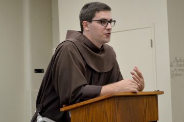 Brother Casey Cole OFM spoke at St. Monica-St. George on July 10. (CT Photo/Greg Hartman)