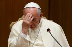 Pope Francis gestures before speaking about the death penalty at an event marking the 25th anniversary of the Catechism of the Catholic Church, at the Vatican in this Oct. 11, 2017, file photo. The pope ordered a revision to the catechism to state that the death penalty is inadmissible and he committed the church to its abolition. (CNS photo/Paul Haring)