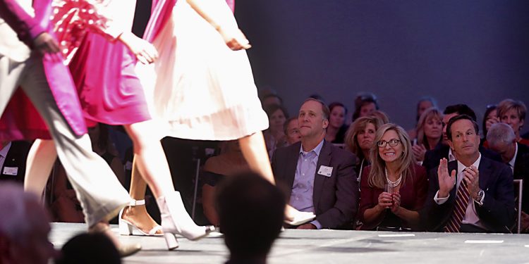 Patrons watch the fashion show during RetroFittings 2018, a St. Vincent de Paul fundraising event, at Music Hall in Cincinnati Thursday, Oct. 18, 2018. (CT Photo/E.L. Hubbard)