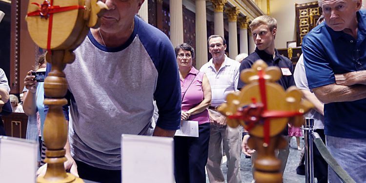 Parishioners examine the relics of Saint Pio of Pietrelcine, O.F.M Cap, at Saint Peter in Chains Cathedral in Cincinnati Wednesday, Oct. 3, 2018. (CT Photo/E.L. Hubbard)