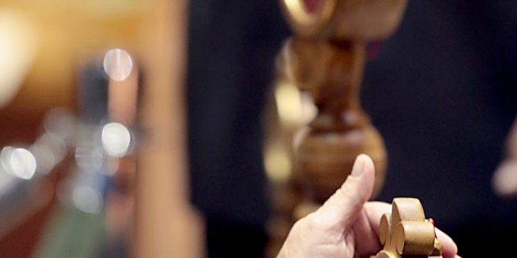 Parishioners venerate the relics of Saint Pio of Pietrelcine, O.F.M Cap, at Saint Peter in Chains Cathedral in Cincinnati Wednesday, Oct. 3, 2018. (CT Photo/E.L. Hubbard)