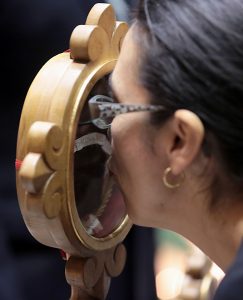 A woman kisses a relic of Saint Pio of Pietrelcine, O.F.M Cap, at Saint Peter in Chains Cathedral in Cincinnati Wednesday, Oct. 3, 2018. (CT Photo/E.L. Hubbard)