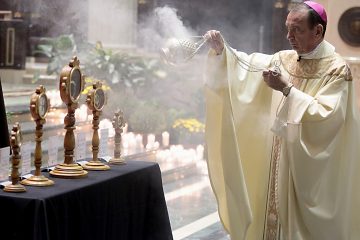 Archbishop Dennis Schnurr censes the relics of Saint Pio of Pietrelcine, O.F.M Cap, at Saint Peter in Chains Cathedral in Cincinnati Wednesday, Oct. 3, 2018. (CT Photo/E.L. Hubbard)