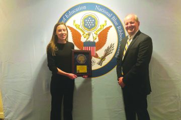 MTCES Junior High Teacher Amanda Ocartz and and Chariman Brian James represented the school at the Blue Ribbon Ceremony in Washington D. C. (CT Photo by David Moodie)