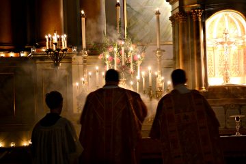 The night is advanced, the day is at hand. Let us then throw off the works of darkness [and] put on the armor of light Romans 13:12 Rorate Mass Old St Mary (CT Photo/Greg Hartman)