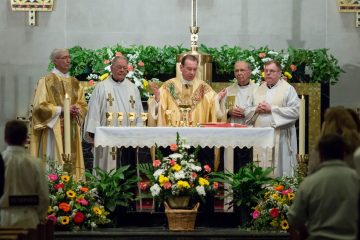 The Most Reverend Archbishop Dennis M. Schnurr celebrates the Eucharist during the Mass celebrating the dedication and blessing of The Cross and Crown Atrium at Our Lord Christ the King Church. (Left to right) Deacon Don Gloeckler, Reverend Frank Voellmecke, Archbishop Dennis Schnurr, Reverend Bob Obermeyer, and Pastor Ed Smith. (Courtesy Photo