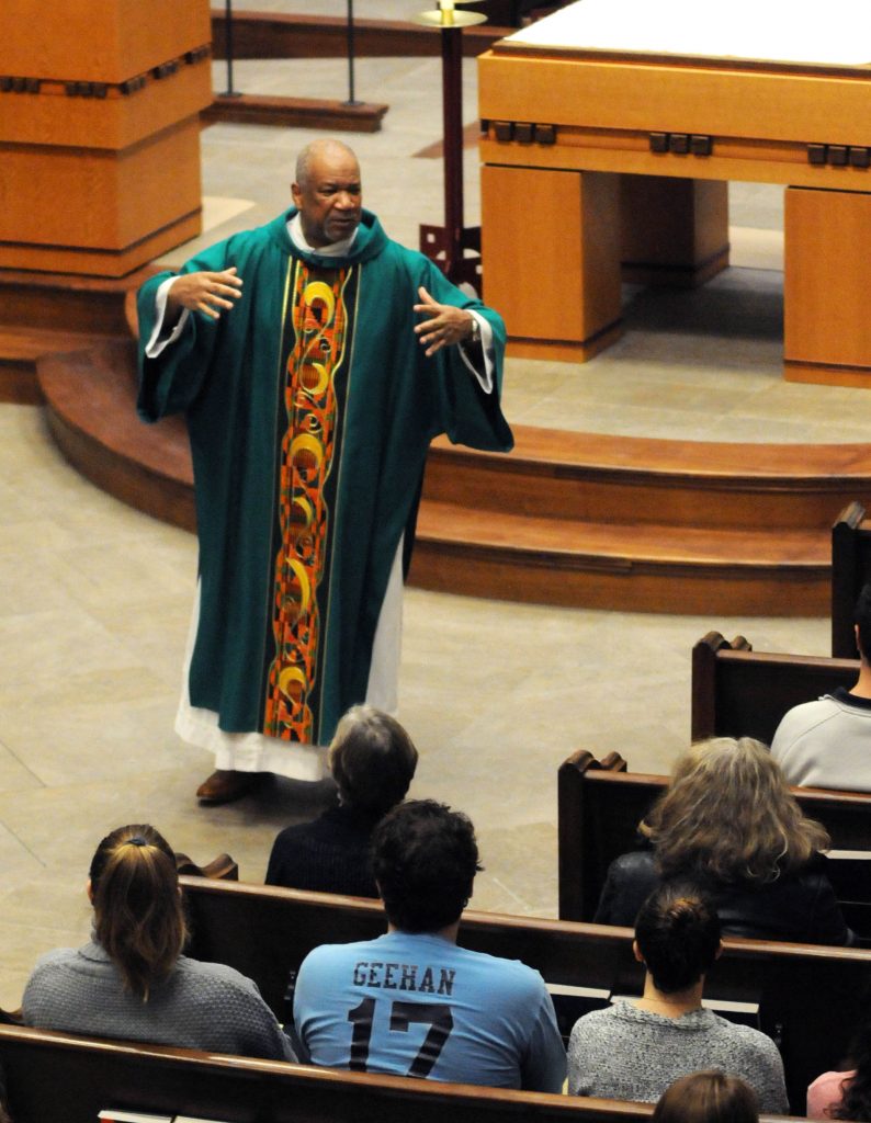 Rev. Mr. Royce Winters, Director of the Office of African American Catholic Ministries for the Archdiocese of Cincinnati, gives his homily during the University of Dayton's "Mass in Celebration of Black History Month" on Sunday, Feb.10 at UD's Chapel of the Immaculate Conception. (CT Photo/David Moodie)