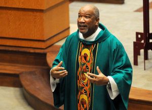 Rev. Mr. Royce Winters, Director of the Office of African American Catholic Ministries for the Archdiocese of Cincinnati, gives his homily during the University of Dayton's "Mass in Celebration of Black History Month" on Sunday, Feb.10 at UD's Chapel of the Immaculate Conception. (CT Photo/David A. Moodie)