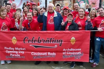 Bishop Binzer and members of the Central Offices of the Archdiocese of Cincinnati ready for the 2019 Findlay Market Opening Day Parade. (CT Photo/Greg Hartman)