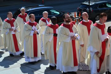 Priest throughout the Archdiocese of Cincinnati process during Diaconate Ordination. (CT Photo/Greg Hartman)