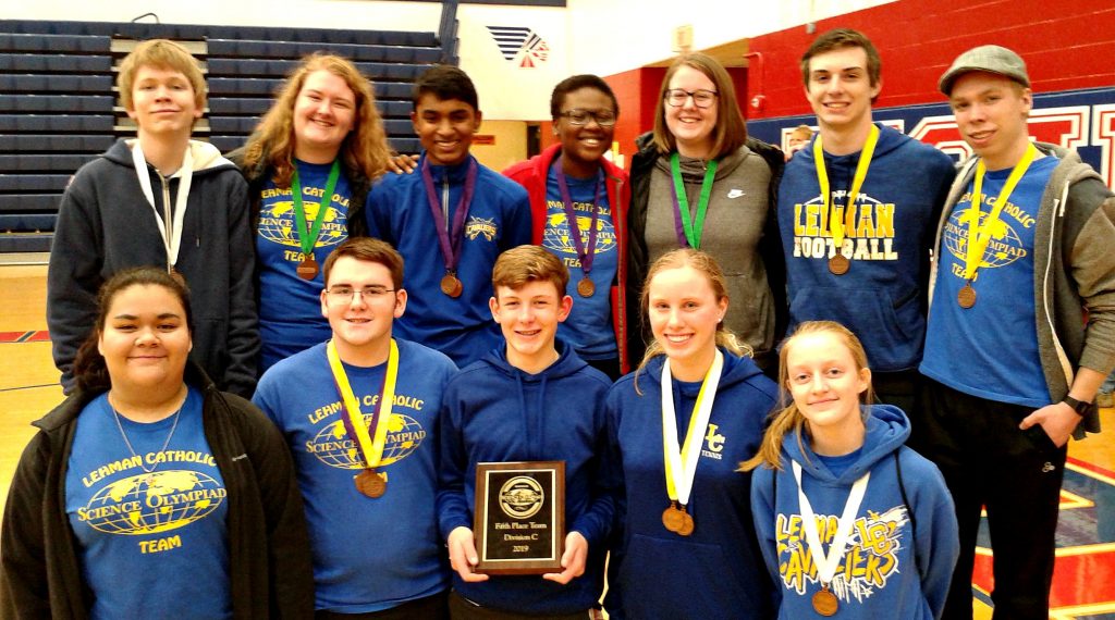Lehman Catholic Science Olympiad Team members who participated in the Regional Science Olympiad. Back Row: Casey Topp, Mary Deafenbaugh, Joshua George, Rebecca Sanogo, Ann Deafenbaugh, Nicholas Largent and Aaron Topp. Front Row: Lexy Casillas, Joe Ritze, Max Schmiesing, Angela Brunner and Emily Bornhorst. Not Pictured: Elias Bezy, Jacquie Schemmel and Michael O'Leary.