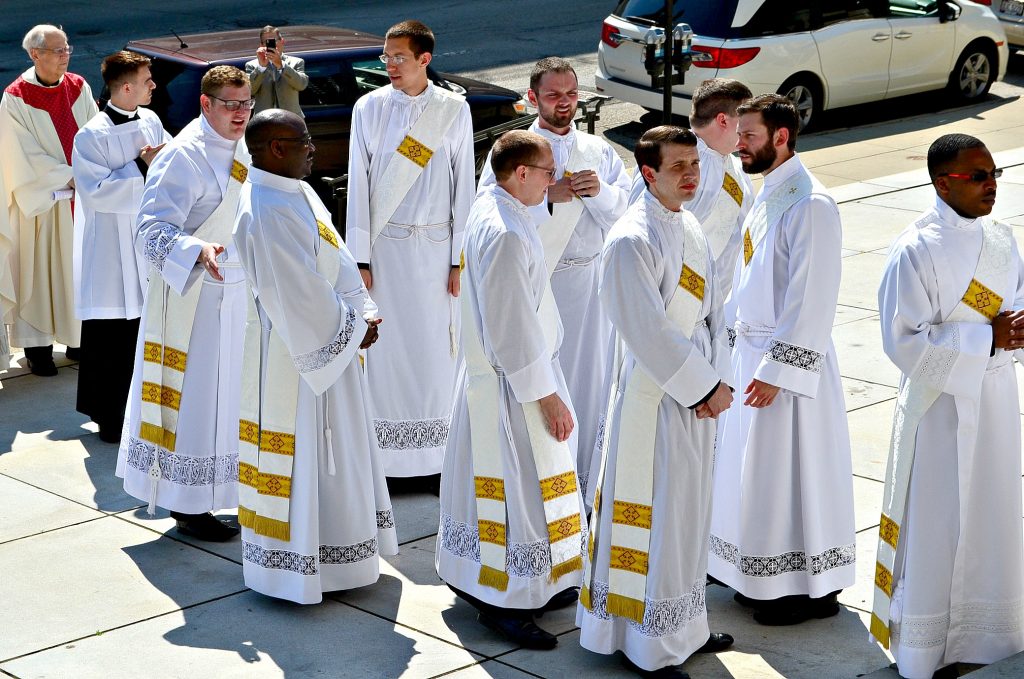 Last time these 9 men enter the Cathedral as Deacons. (CT Photo/Greg Hartman)