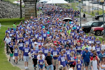 A sea of blue fills the levee during the Cross the Bridge for Life in Newport, Ky. Sunday, June 2, 2019. (CT Photo/E.L. Hubbard)