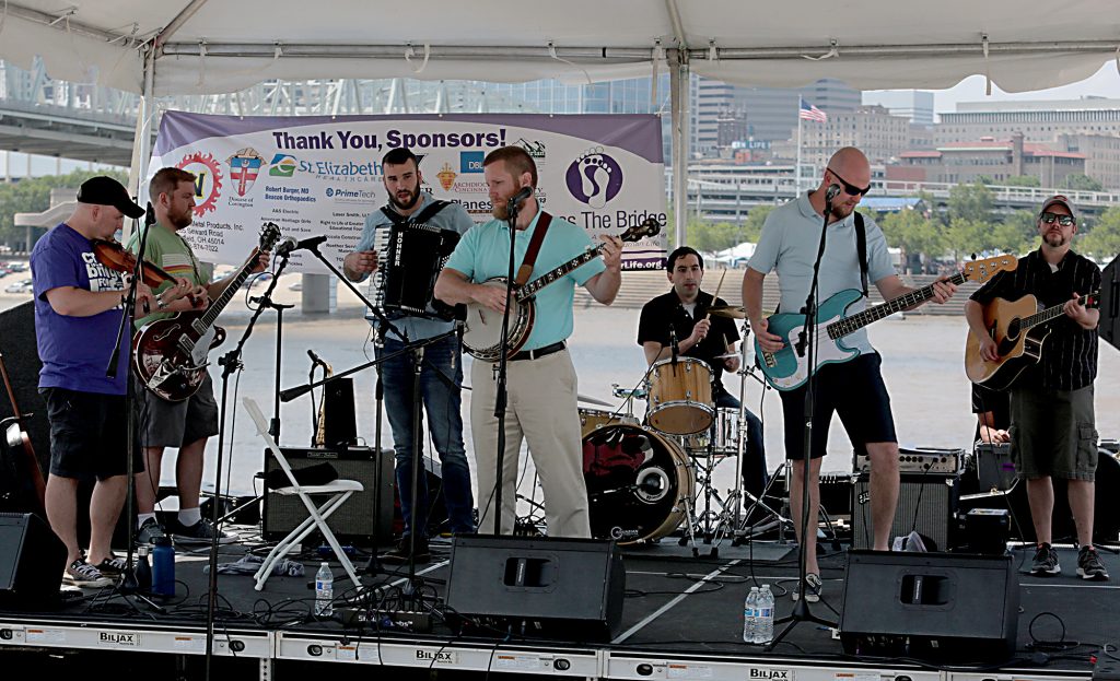 Easter Rising performs during the Cross the Bridge for Life in Newport, Ky. Sunday, June 2, 2019. (CT Photo/E.L. Hubbard)
