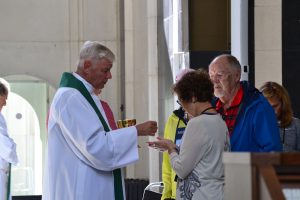 Father David Brinkmoeller distributes Communion at Mass at Our Lady of Merixtell in Merixtell, Andorra. (CT Photo/Greg Hartman)